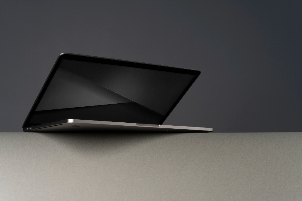laptop device with minimalist monochrome background